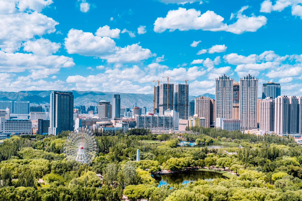 Panoramic view of Hohhot city blending modern buildings with traditional Mongolian architecture